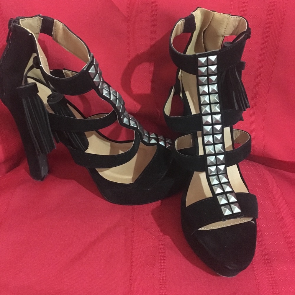 Pair of black-and-silver studded heels size 9 1/2.